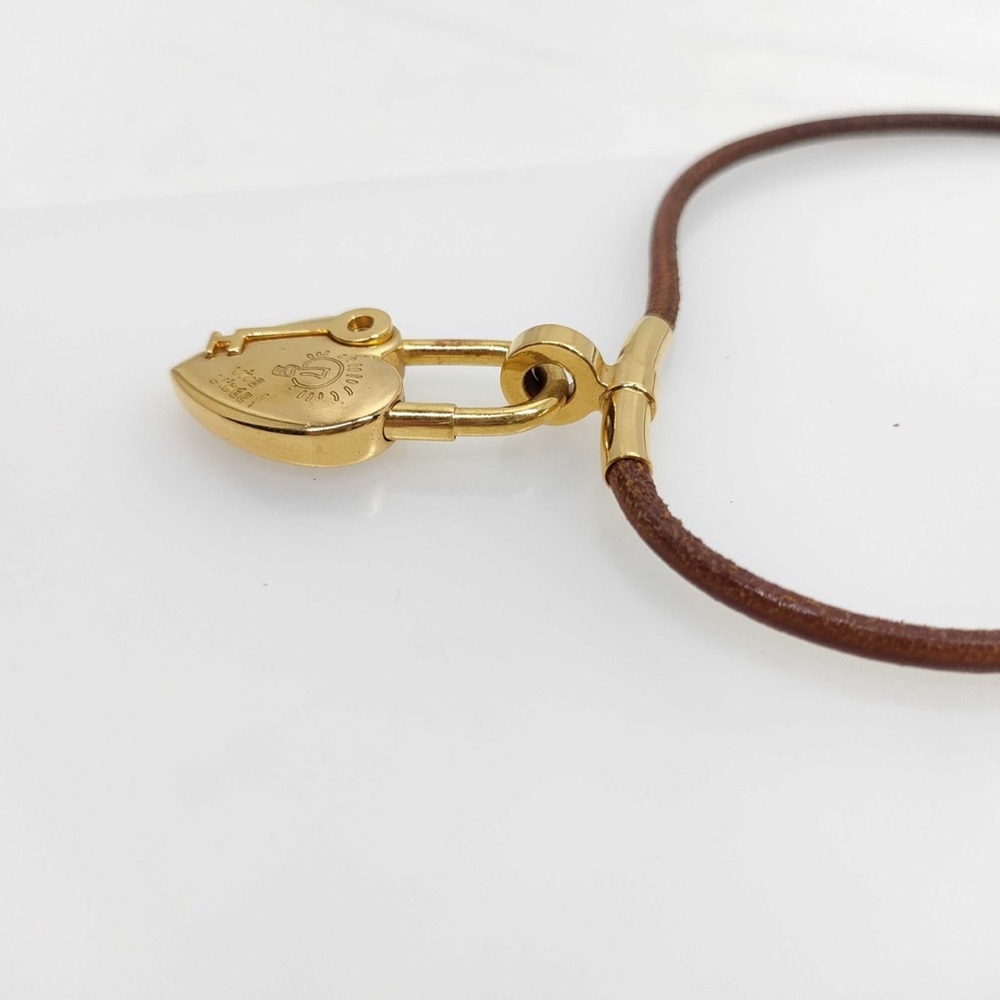 Hermès “Vive L’Idée” heart-shaped cadena padlock on brown leather cord choker - Picture 2 of 6